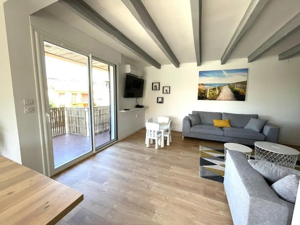 Appartement spacieux 4 chambres, jardin, proche centre-ville
