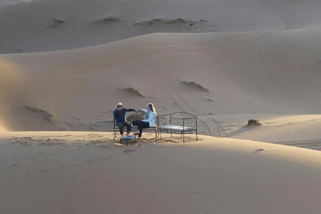 Enjoy Moda Camp Merzouga tours- Camel sunset sunrise Quad Sunboarding ATV