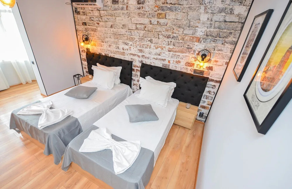 One by One by Grand Accommodation