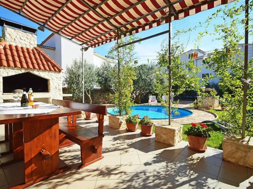Three Apartment Complex With Pool