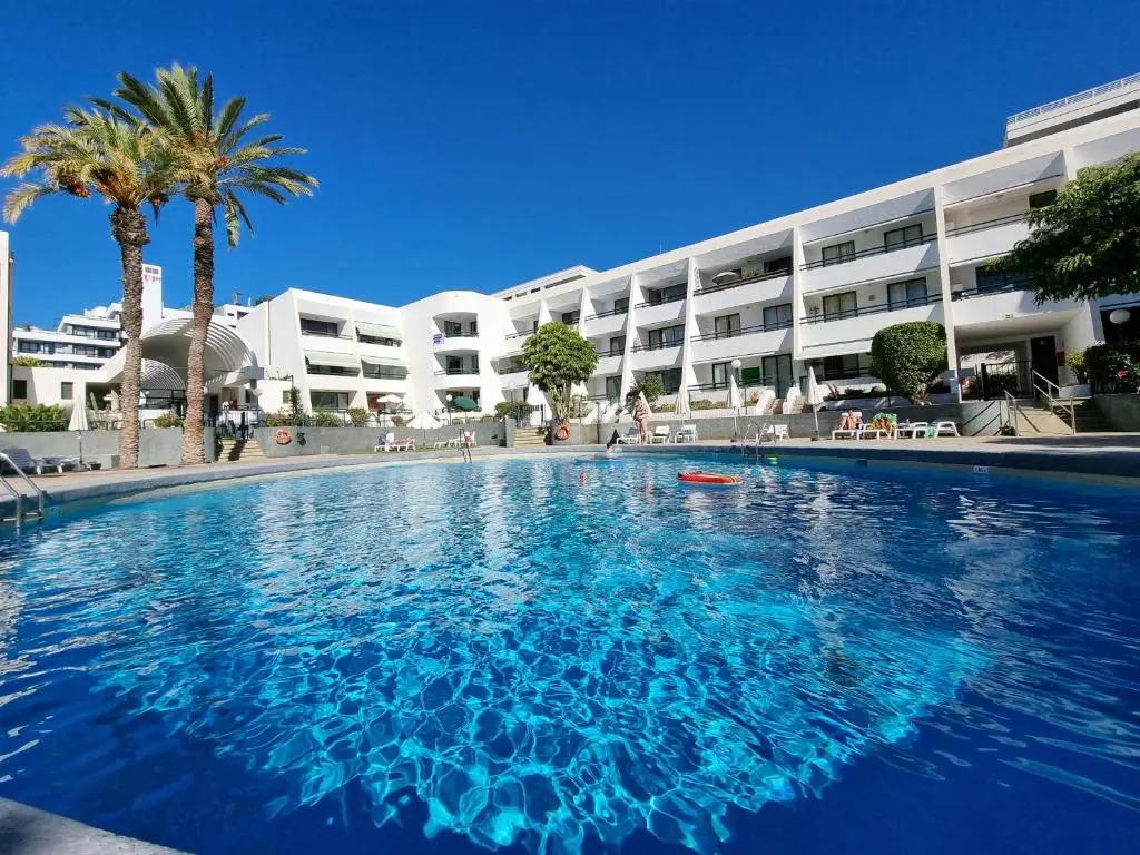 Apartment Casa Palmera only 150 meters to the beach, heated pool, wifi, SAT-TV, balcony with poolview
