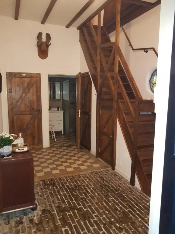 In het koetshuis