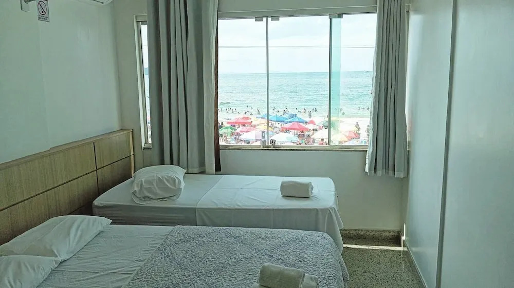 Triplex pé na areia