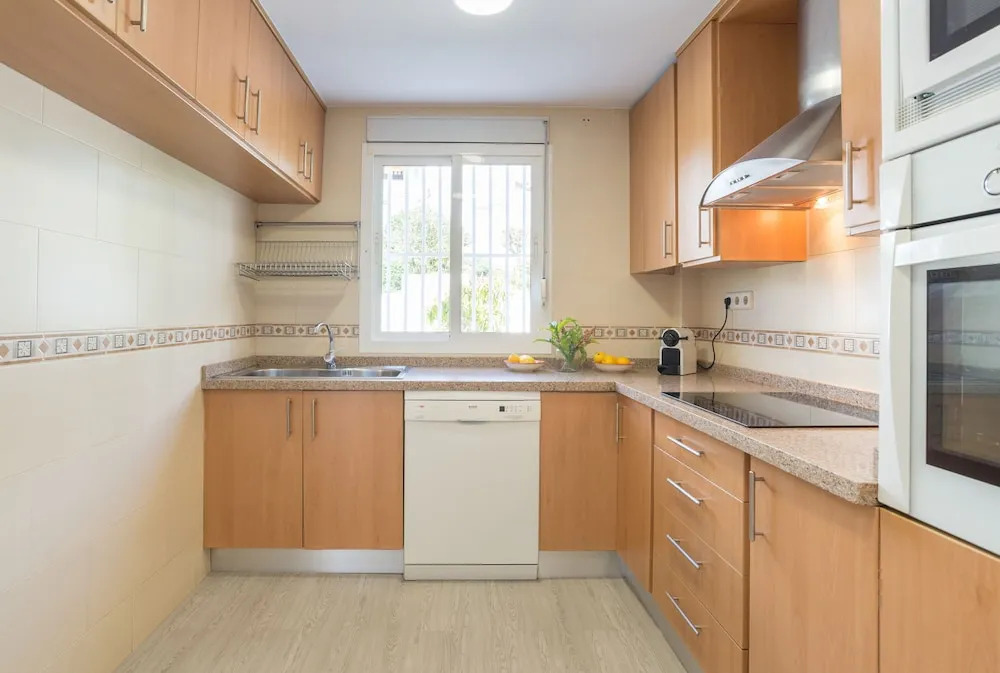 Benalmadena: adosado con piscina y jardin