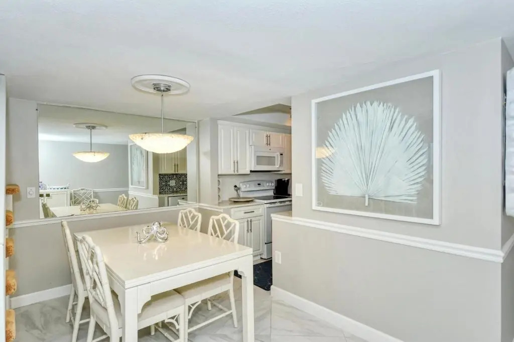 LaPlaya 108B Dream views of the Gulf from your private balcony or screened lanai just steps from the beach