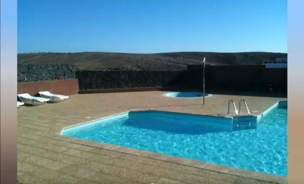 House With 3 Bedrooms in Playa Blanca, With Wonderful sea View, Shared Pool, Enclosed Garden Near the Beach