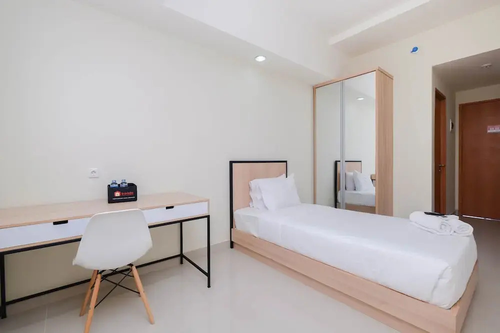 Best Deal and Tidy Studio at Evenciio Margonda Apartment By Travelio