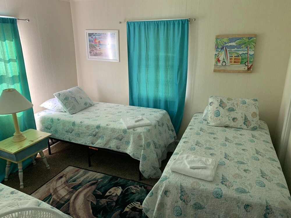 Queen Anne's Revenge At The Beach 3 Bedroom Cottage by RedAwning