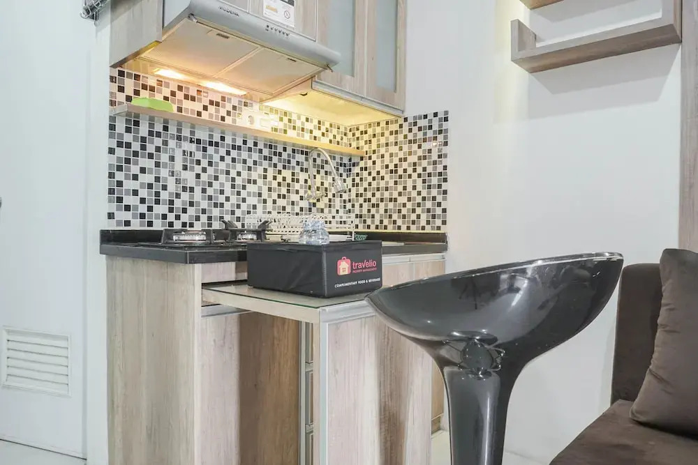 Cozy Stay at 2BR Green Pramuka Apartment near Shopping Center