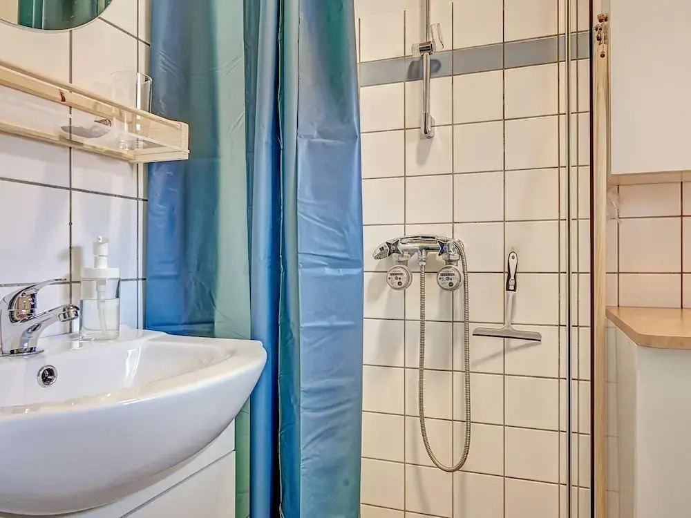 4 person holiday home in Gudhjem