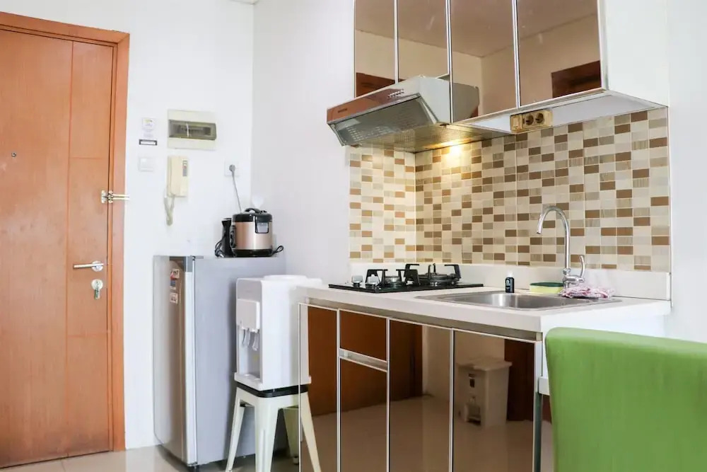 Great Location and Comfy 1BR Apartment at Woodland Park Residence By Travelio