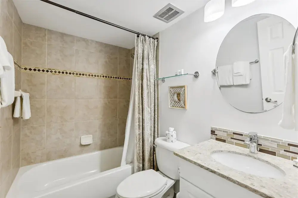 Beachfront Gem: Serene 2BD Haven With Pool & Views