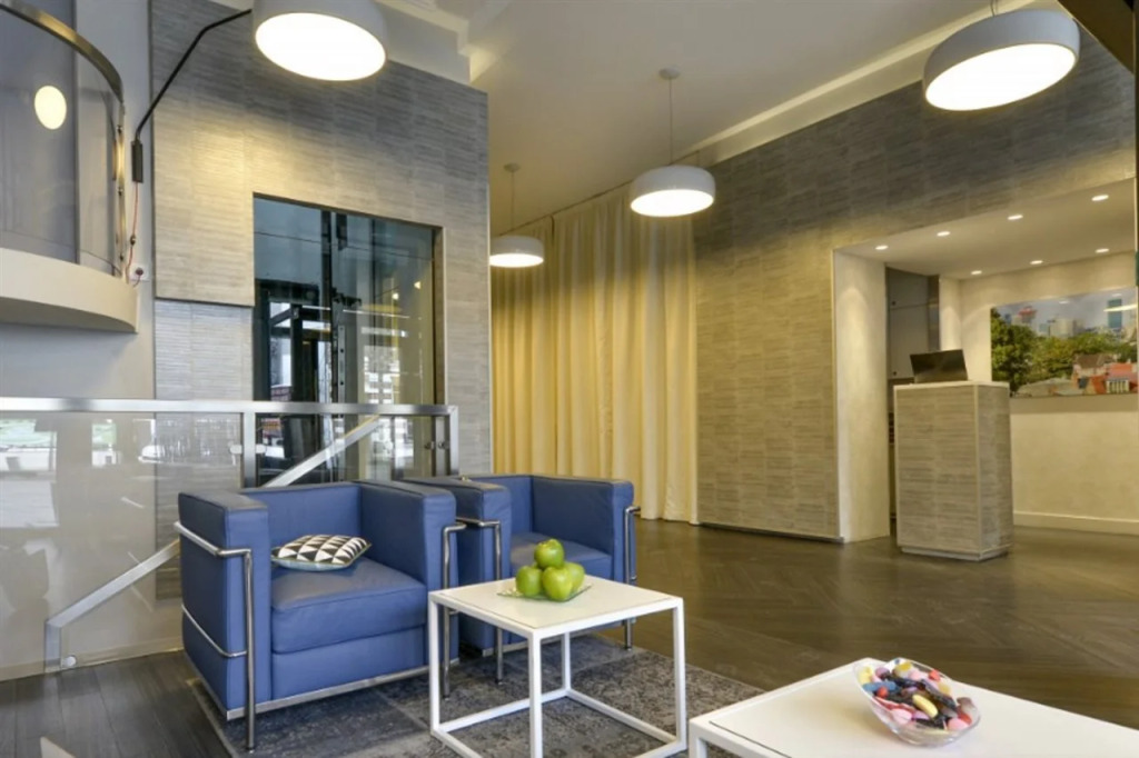 Hotel Atrium by Happyculture
