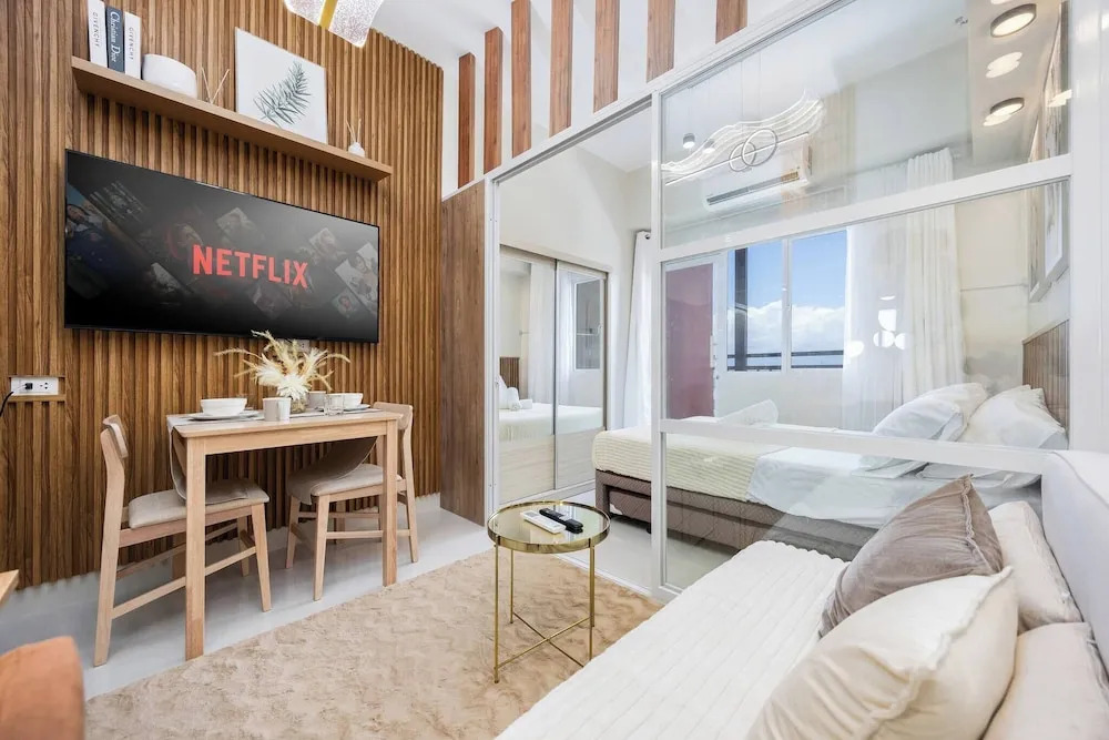 Elegant Wood-accent Studio With Balcony