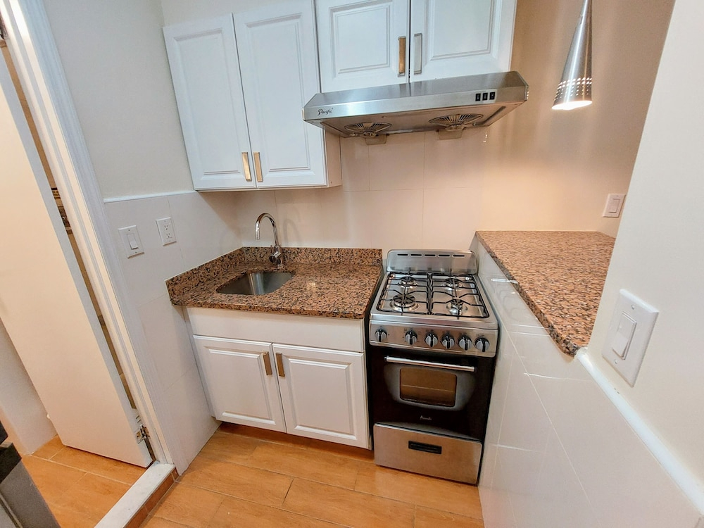 Comfortable Apartment with Kitchen and Work Station