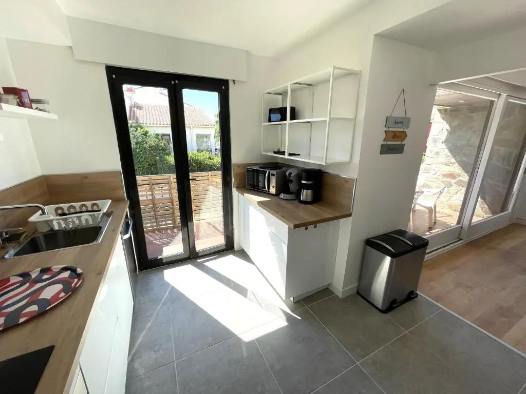 Appartement spacieux 4 chambres, jardin, proche centre-ville
