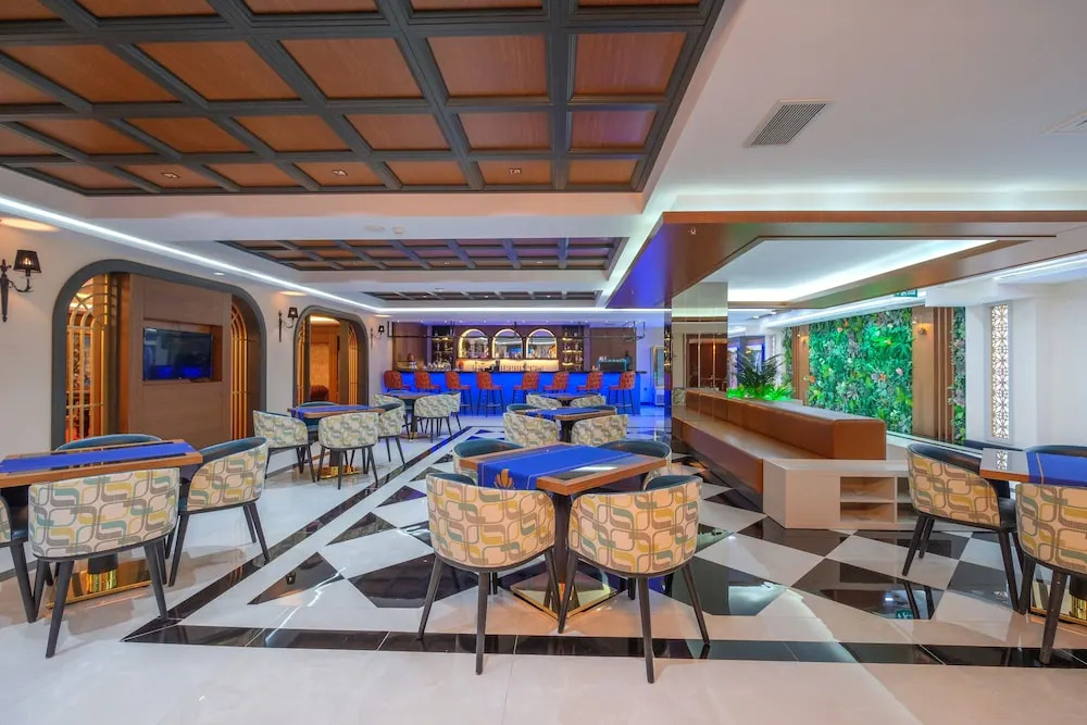 Отель Elysium Deluxe Suites