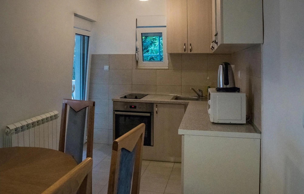 Nice home in Herceg Novi w/ Outdoor swimming pool, Sauna and 4 Bedrooms