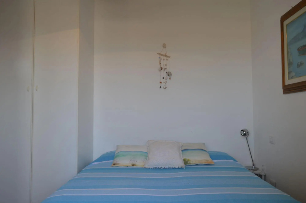 Holiday home on the Torregrande seafront, 30 meters from the seashore-Casa delle Palme