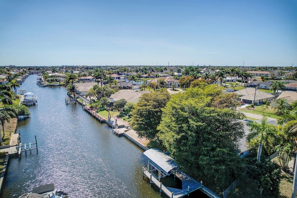 Boat Dock & Pool: Canal-front Cape Coral Gem