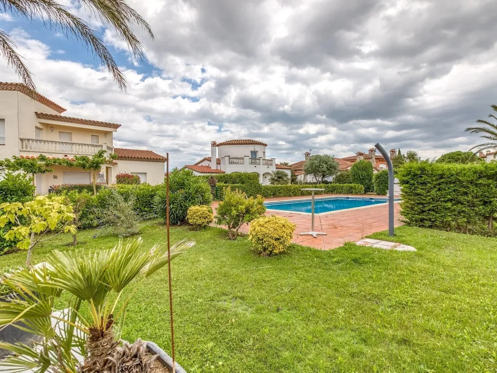 Cosy Townhouse in Vilamacolum With Shared Garden and Swimming Pool