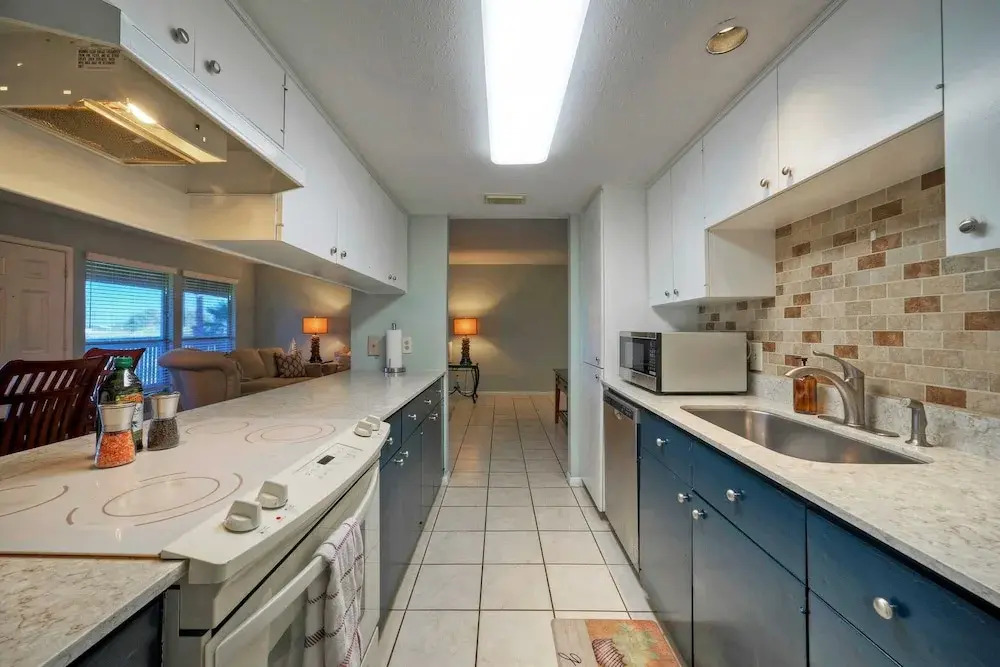 Minutes to the Beach, Pool, Balcony w/ Nature Views Compass 17 by Avantstay