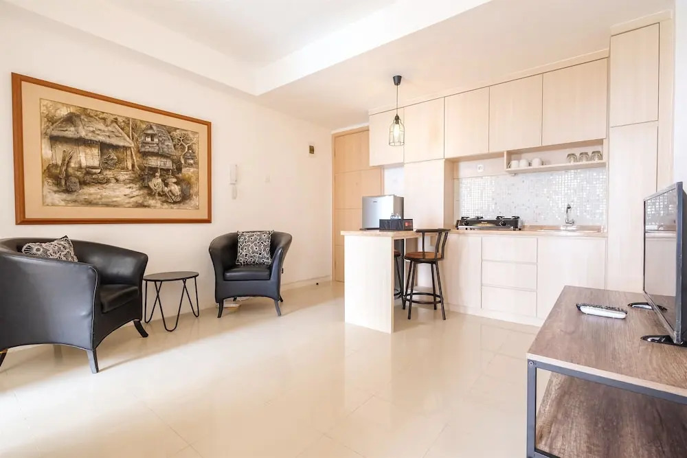 Spacious 2 Bedroom at Bassura City Apartment By Travelio