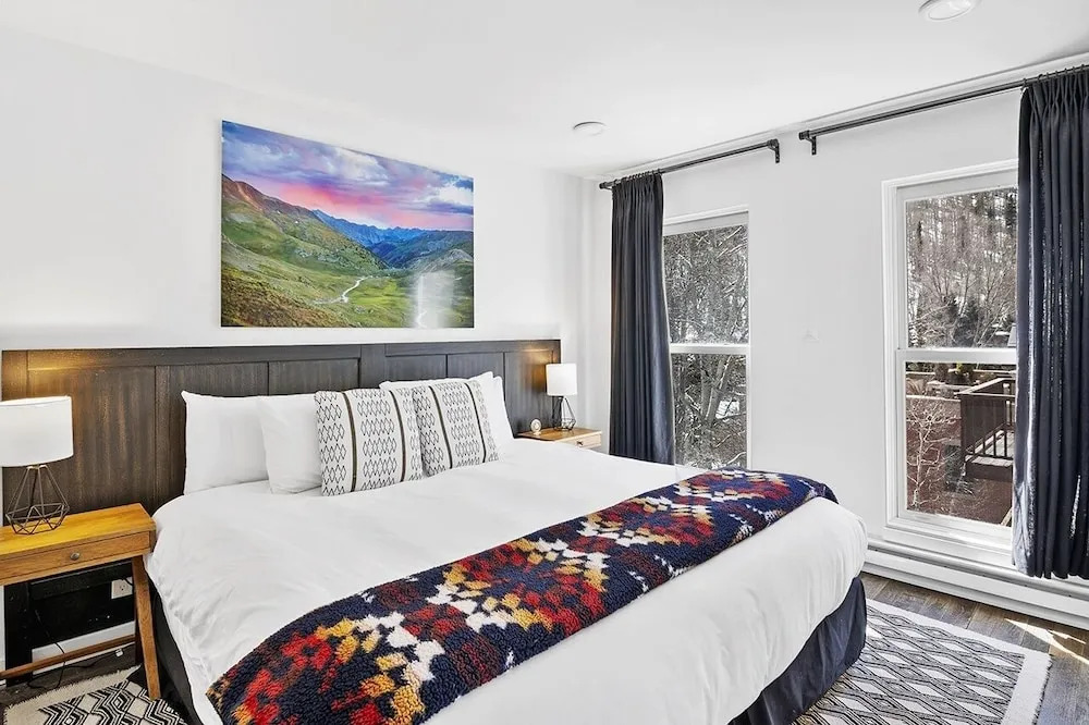 Top Floor Condo With Balcony Steps To Lifts & Main Street 2 Bedroom Condo by RedAwning