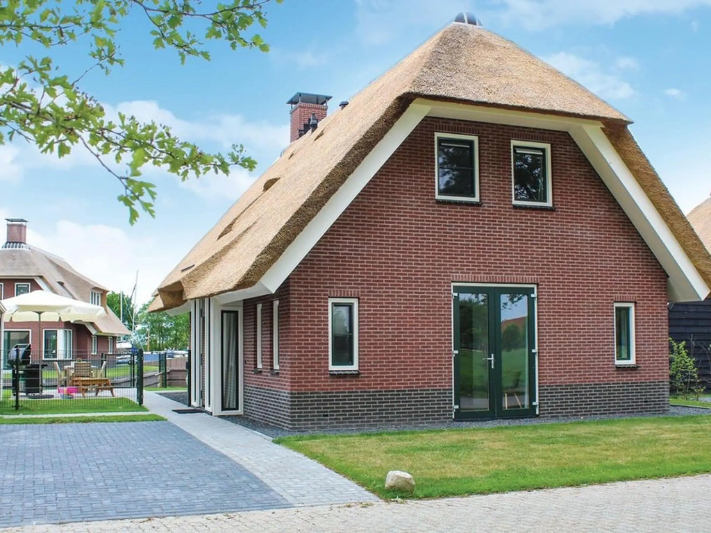 Villa in Friesland with Waterfront Jetty