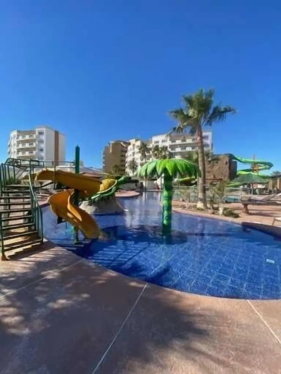 Spectacular 2 Bedroom Condo on Sandy Beach at Las Palmas Resort B-705 1 Condo by RedAwning