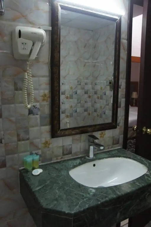 Отель Three 888 Hotel