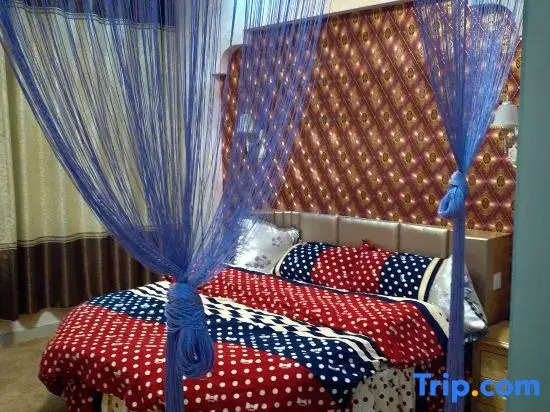 Xinyang Cozy Themed Hotel (Normal University East Gate)
