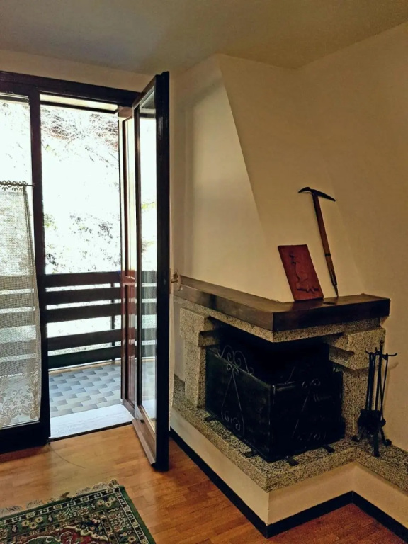 026 Bilocale con Caminetto Giustino