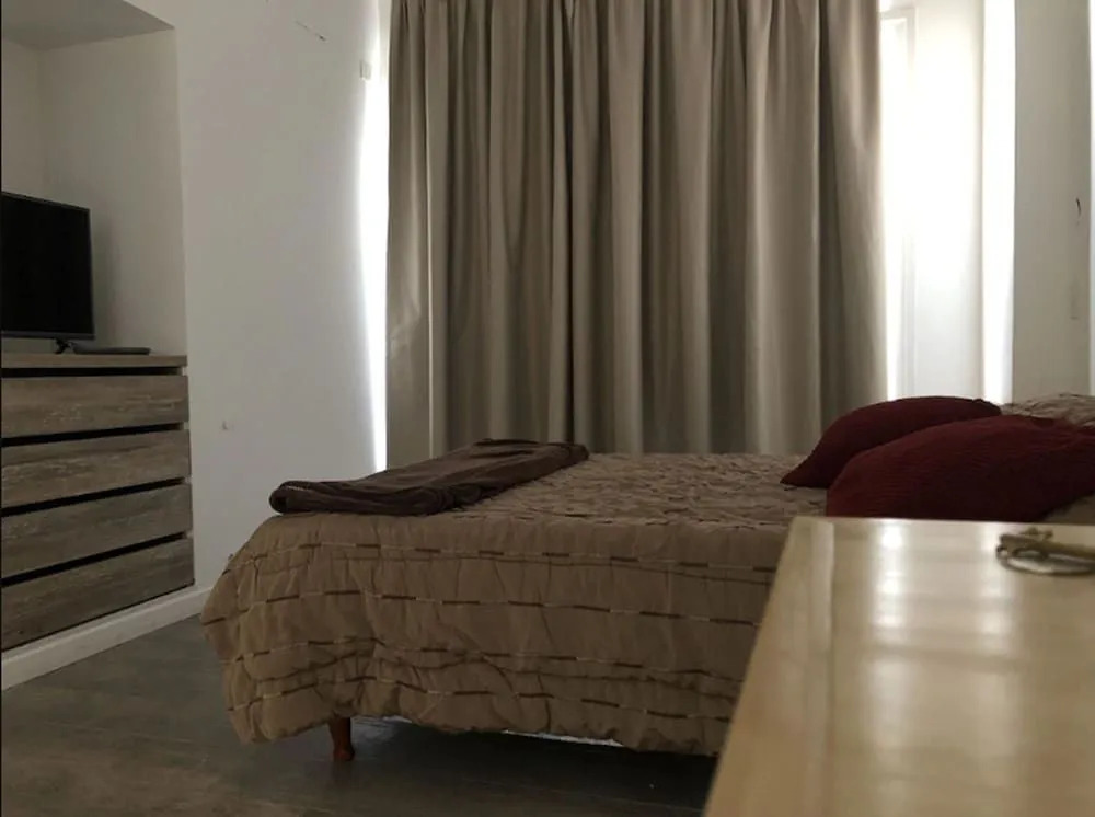 Lujan Homes Apart Hotel