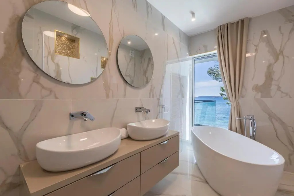 Beachfront Villa with Heated Infinity Pool and Direct Sea Access Kastela near Split