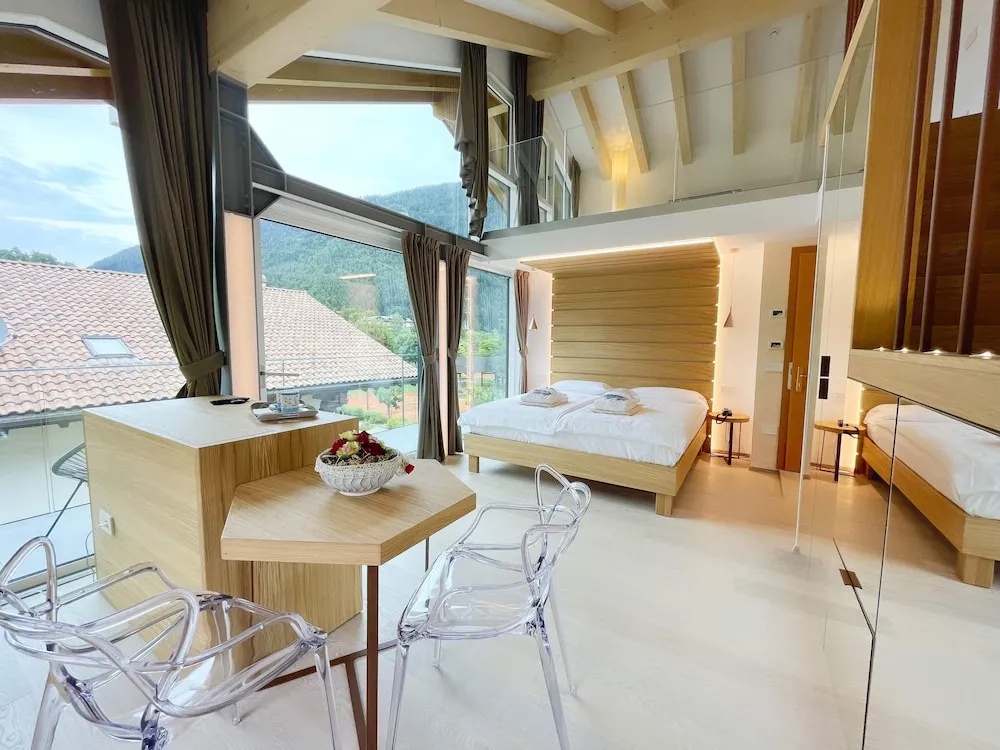 Alledolomiti Boutique Lake Hotel