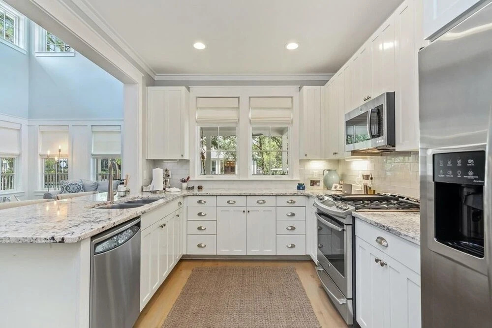 Golf Cart Screened-in Porch & Grill Station Close To Camp Watercolor 4 Bedroom Home by RedAwning