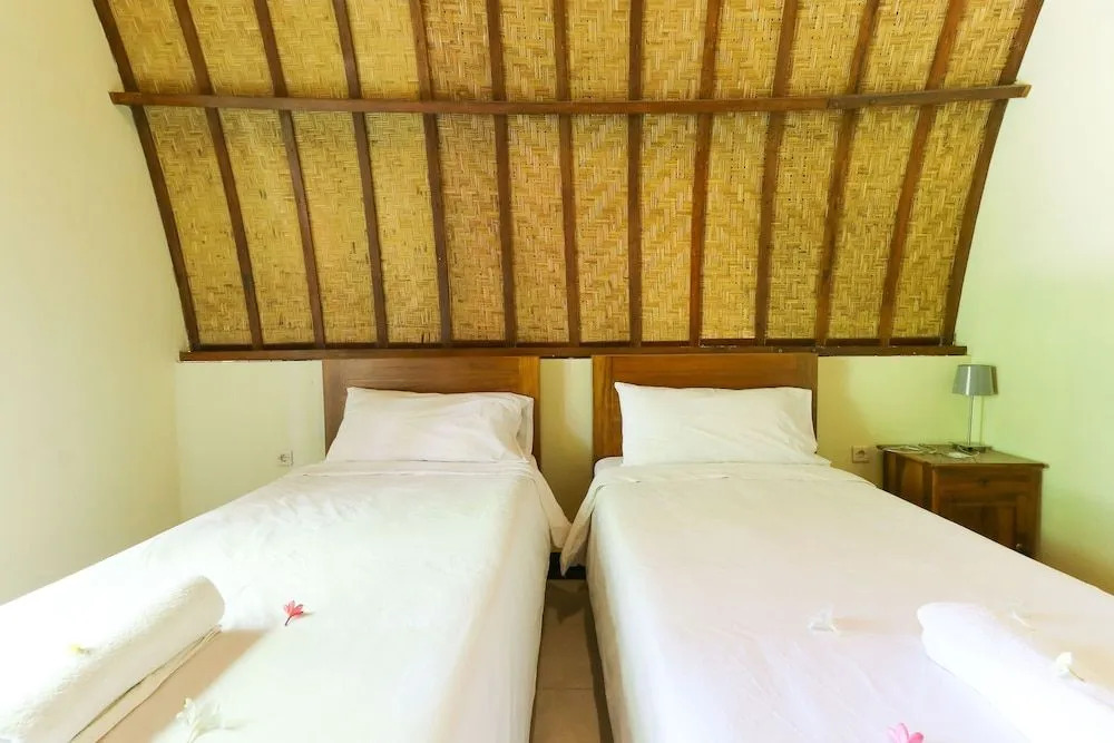 Ratu Cottage by OurStory Travels
