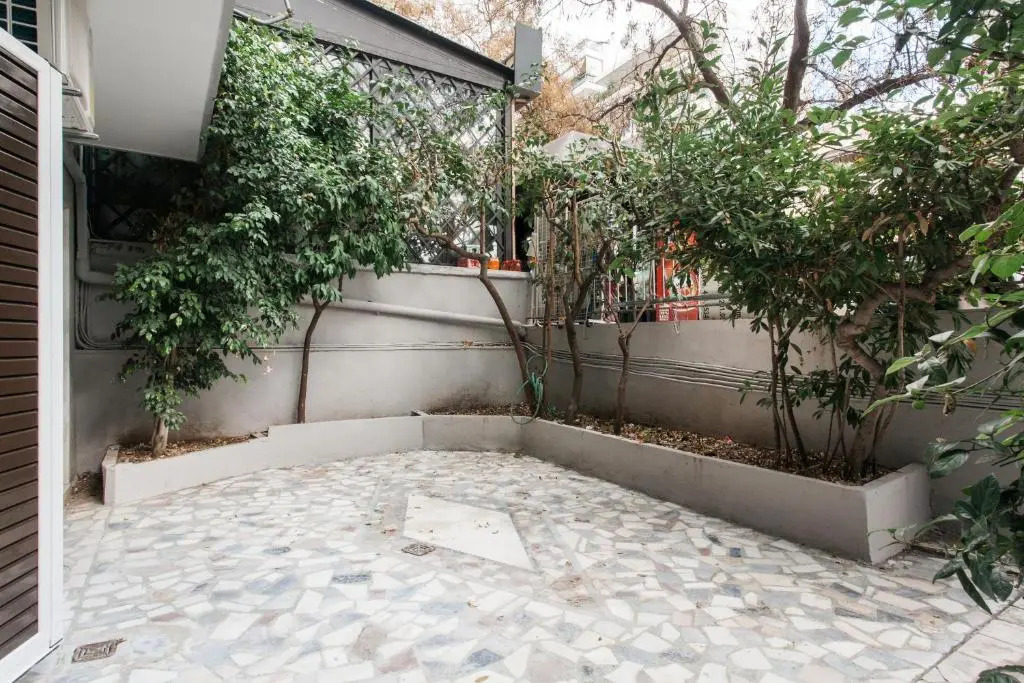 Walk through Athens, based in a local’s hip house!