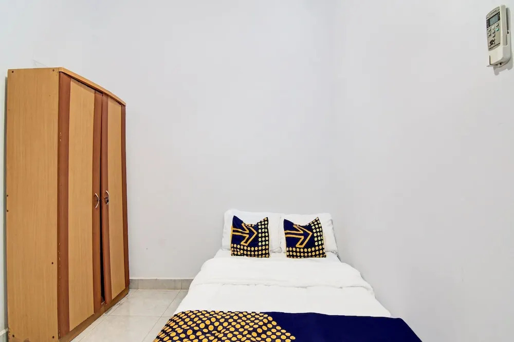 SPOT ON 91950 Guest House TekNong Syariah
