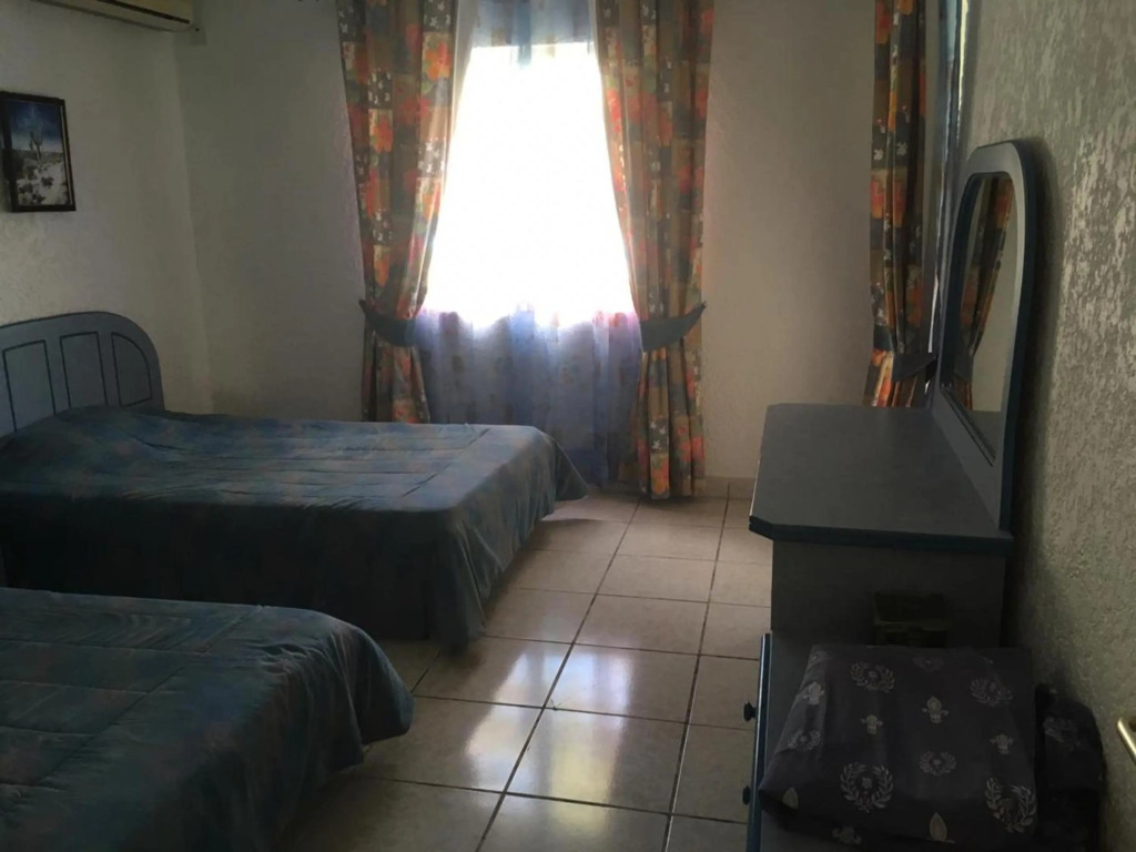 2 bedrooms appartement at Flic en Flac 500m away from the beach with shared pool enclosed garden and wifi