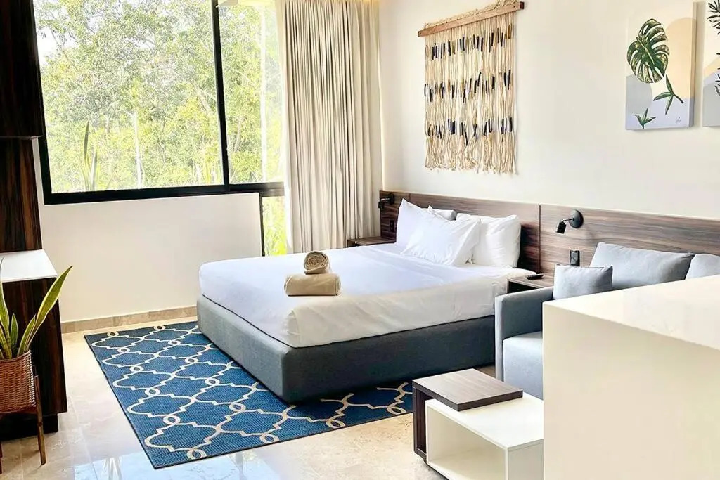Fresh and Stylish Studio Aldea Zama rooftop pool Mya 109