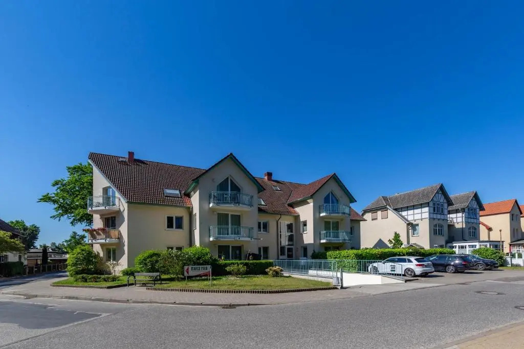Ferienwohnung Tine mit Balkon, Fahrrädern und Strandkorb im Sommer