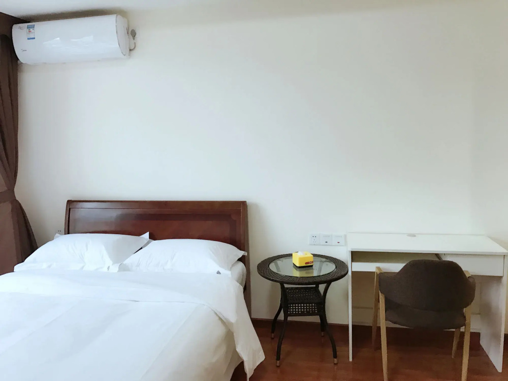 Xingyue Apartment Luogang Wanda