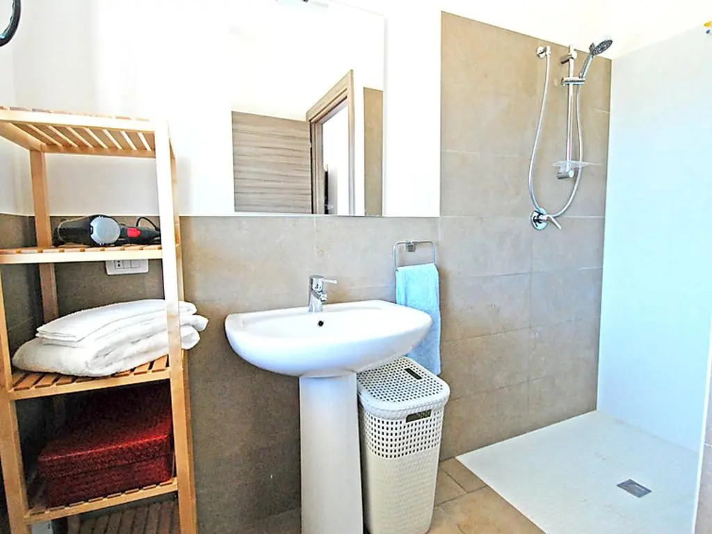 2 bedrooms house with enclosed garden and wifi at Sant'Anna Arresi 3 km away from the beach