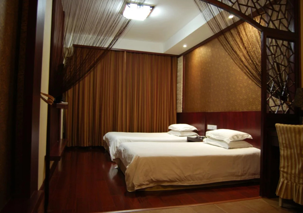 Baolong Homelike Hotel (Youyi Branch)