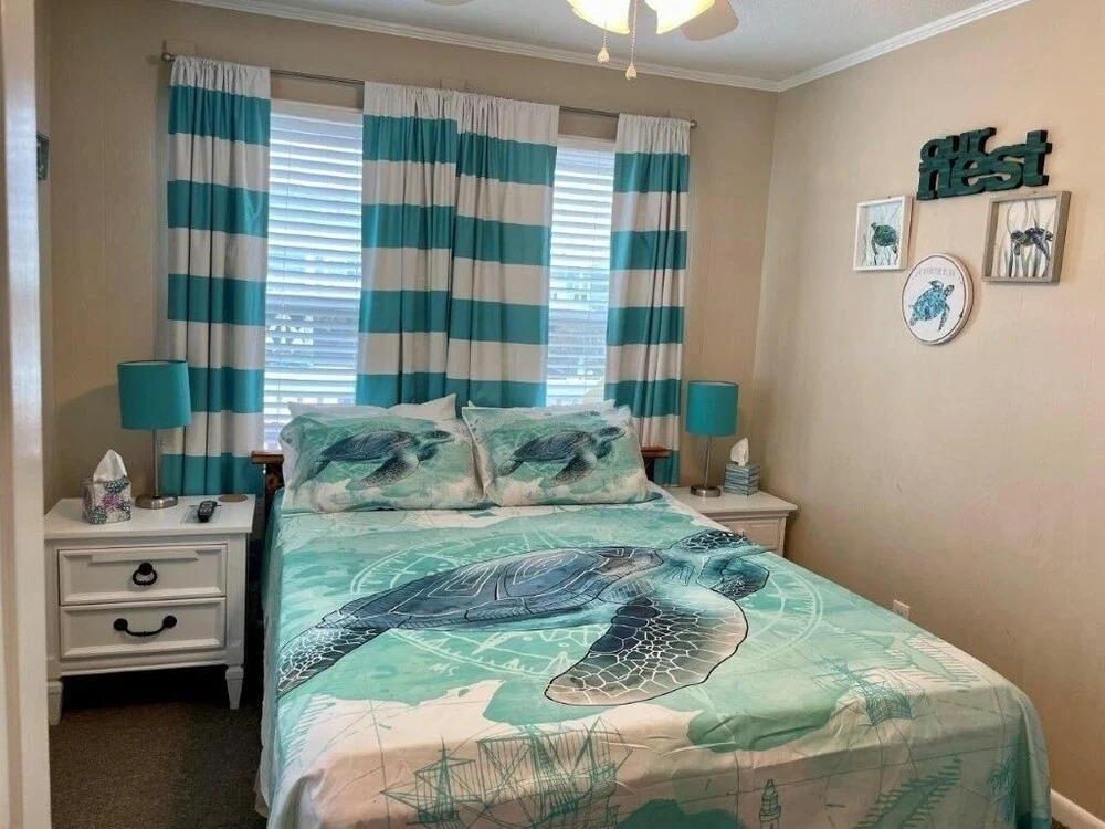 Sandy Bottoms 4 Bedroom Home by RedAwning