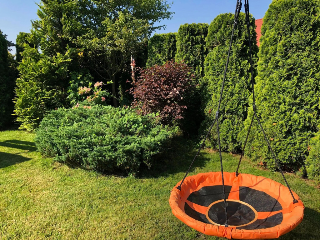 Half of holiday home, terrace, playground
