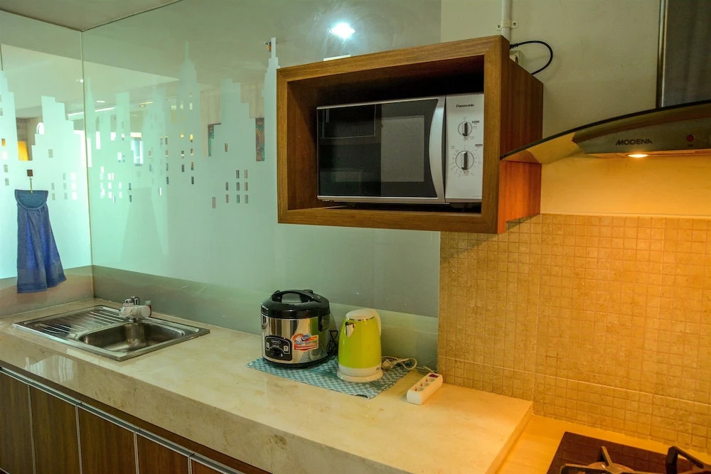 Cozy Pool View Kemang Village Residence Apartment with Direct Access To Mall