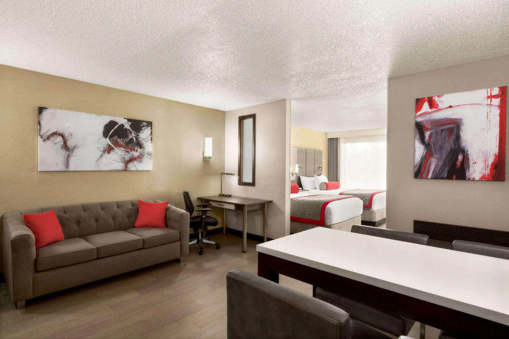 Ramada by Wyndham Suites Orlando Airport- Free Airport Shuttle